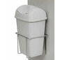 A Novocal plastic waste container (15 liters, gray, with lid) is placed in a metal wall mount that is attached to a light-colored wall.