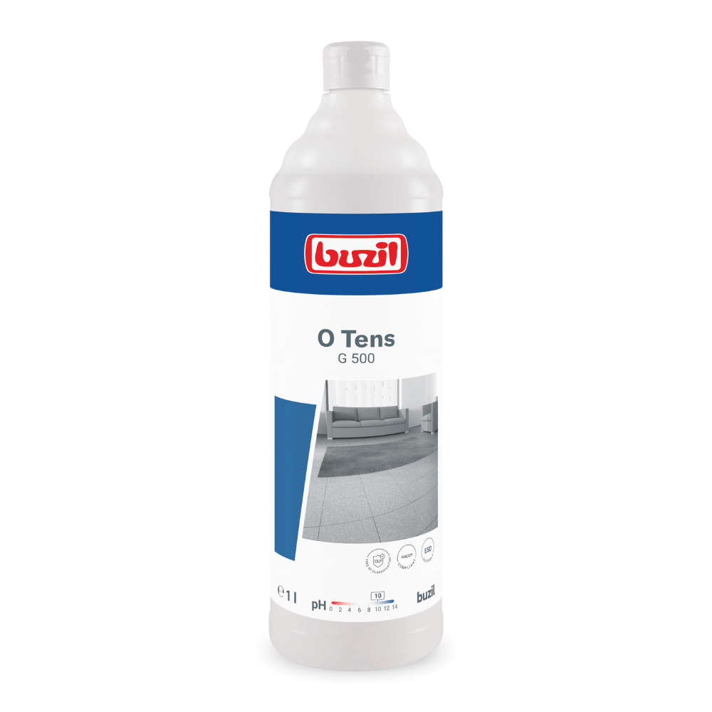 A white bottle labeled "Buzil O Tens G 500 Surfactant-Free Universal Cleaner on Citrate Base" from BUZIL-WERK Wagner GmbH & Co. KG features a striking blue label, a red logo, and images of surfaces with low re-soiling properties. This citrate-based universal cleaner has a capacity of 1 liter and includes symbols for pH value and material compatibility.