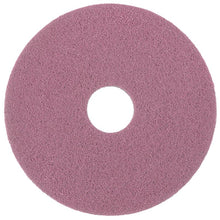 Das Diversey Twister Pad Pink für Vinylböden von Diversey Deutschland GmbH & Co. OHG ist ein rundes, rosafarbenes Pad mit Mittelloch und strukturierter Oberfläche, ideal für die Tiefenreinigung von Vinylböden, abgebildet auf weißem Hintergrund.