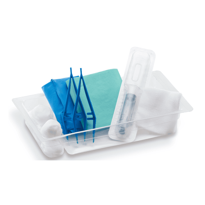 A medical suture set with sterile items, including gauze, tweezers, suture material, and a syringe, neatly arranged in a MediSet® urinary catheter set by Paul Hartmann AG on a white background.