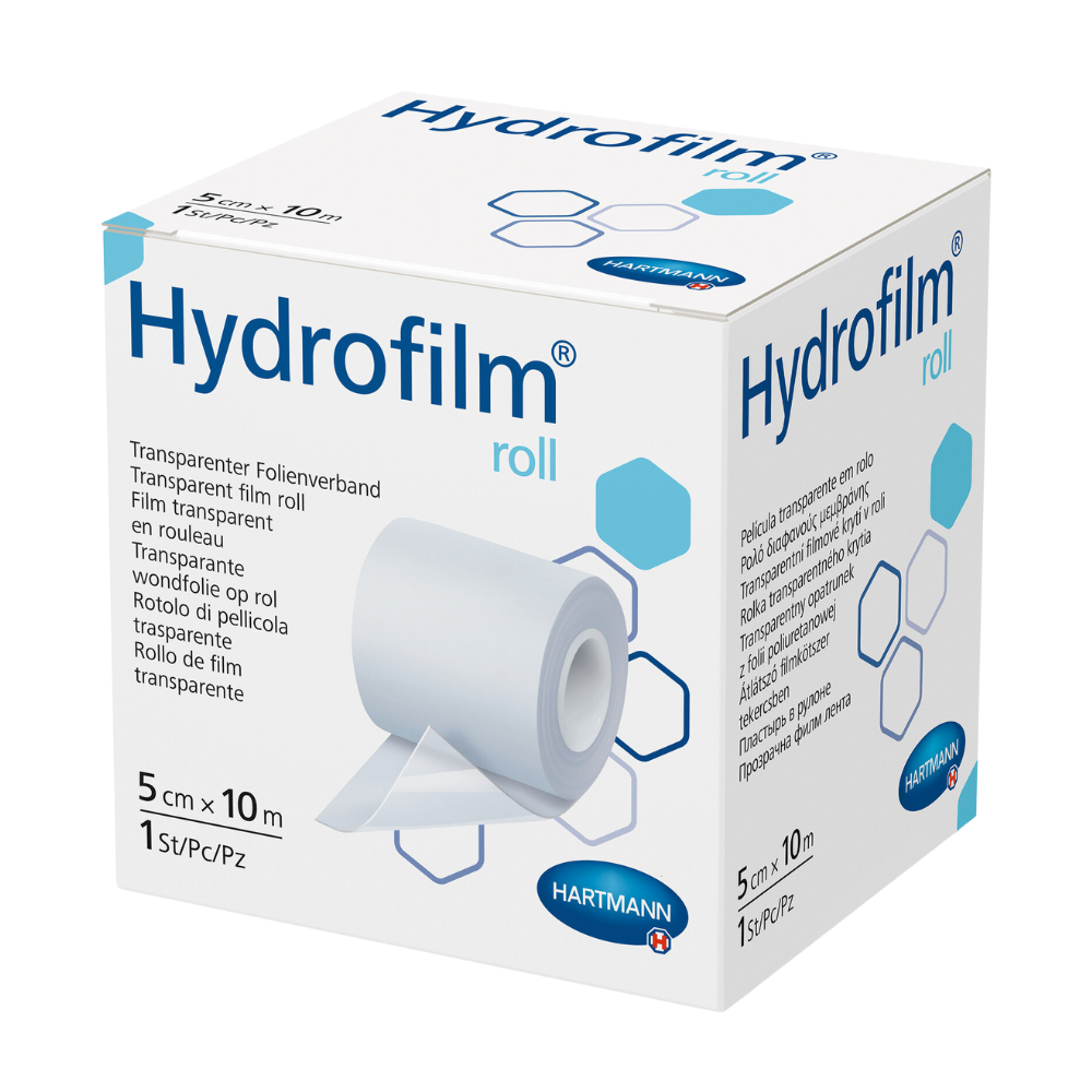 Bosca de rolla Hydrofilm Hartmann® ón Paul Hartmann AG, banna scannáin trédhearcach. Tá an pacáistiú den chuid is mó bán agus gorm éadrom agus taispeánann sé ainm an táirge, íomhánna feidhmithe agus sonraí méide.
