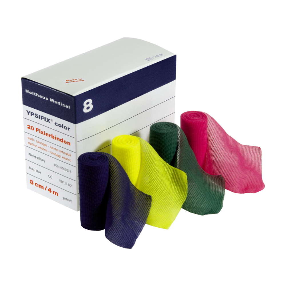 Tá bosca de Holthaus Ypsifix® color Fixierbinde ó Holthaus Medical GmbH & Co. KG léirithe, ar a bhfuil cúig binde leaisteacha i ndathanna éagsúla (corcra, buí, glas, dearg agus gorm) ar a aghaidh. Tá 20 binde sa bhosca (Holthaus Ypsifix® color Fixierbinde, gorm) le toisí 8 cm x 4 m.