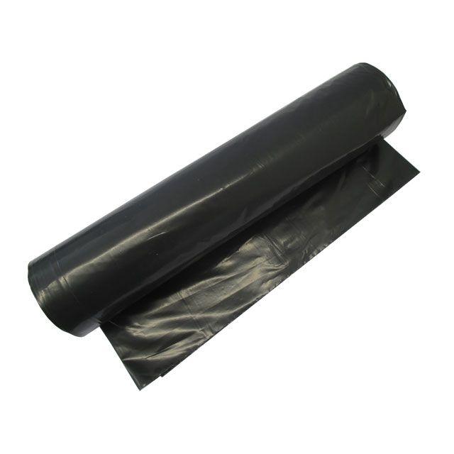 A roll of Abena Re-Seller GmbH garbage bags 70 L (575x1000 mm, 32 my LDPE) for waste disposal, with a black garbage bag partially unrolled and lying flat.