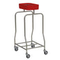 The Novocal stainless steel laundry collector "Compact" single collector with four swivel casters and a red rectangular container is ideal for efficient waste disposal or laundry organization in healthcare.