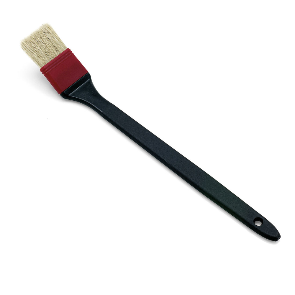 A Nölle Profi Brush industrial radiator brush with a black handle, beige Chinese bristles, and a red plastic ferrule. The handle has a hole for hanging and is depicted at an angle on a white background.