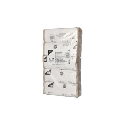 A package of PAPSTAR towel paper C-fold 31 cm x 25 cm natural, single-ply, consists of five vertically stacked rolls. The transparent packaging is provided with white labels containing product details in black print and highlighting recyclability and the Blue Angel certification.