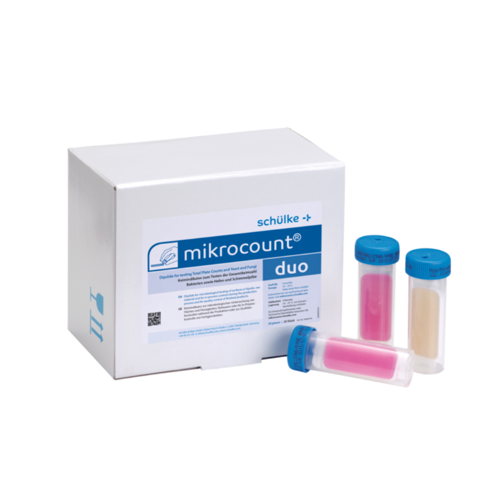 Taispeánann an íomhá bosca leis an inscríbhinn „Schülke mikrocount® duo, Táscaire Miocróbachtaire | Pacáiste (20 píosa)“ den bhranda „Schülke & Mayr GmbH“ in aice le trí fheadán códaithe le dathanna le caipíní gorma. Tá substaintí bándearg agus beige sna feadáin, a úsáidtear chun miocrorgánaigh a bhrath ar dhromchlaí agus i leachtanna, lena n-áirítear giostaí agus múnlaí.