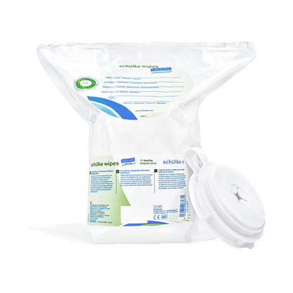 A pack of Schülke & Mayr GmbH Schülke wipes safe&easy cloths for soaking with surface disinfectant in a transparent plastic dispenser with a snap lid. The label contains text and a green cross symbol indicating its use as a medical device.