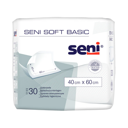 Pacáiste 30 de na pads cosanta leapa Seni Soft Basic (méideanna éagsúla) ón TZMO Deutschland GmbH i mála bán le béim gorm-liath a thairgeann cosaint iontaofa. Tá lógó Seni agus faisnéis táirge le feiceáil go soiléir.