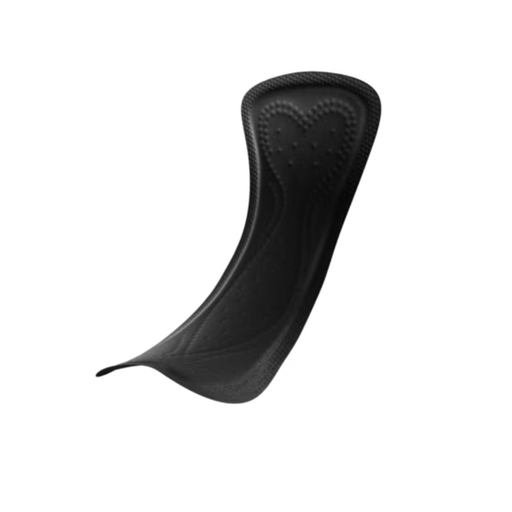 A TENA Silhouette Noir Normal pantyliner in black, manufactured by Essity Germany GmbH, stands out elegantly against a plain white background. Its curved design features a textured surface with a heart pattern in the middle top, offering both elegance and comfort for incontinence pantyliners.