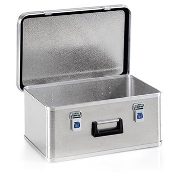 The Novocal transport box is a rectangular, stackable aluminum box with a hinged lid, blue and silver toggle latch, textured surface, black handle, and an open lid revealing the empty interior.