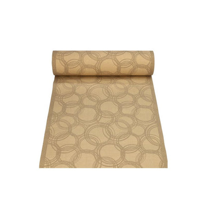 The PAPSTAR table runner fabric-like PV-Tissue Mix from the "ROYAL Collection" of PAPSTAR GmbH consists of a roll of beige fabric with a repeating pattern of overlapping circular loops. This pulp-viscose tissue mix partially unrolls, revealing its smooth texture and subtle sheen, making it the ideal centerpiece for any table decoration.