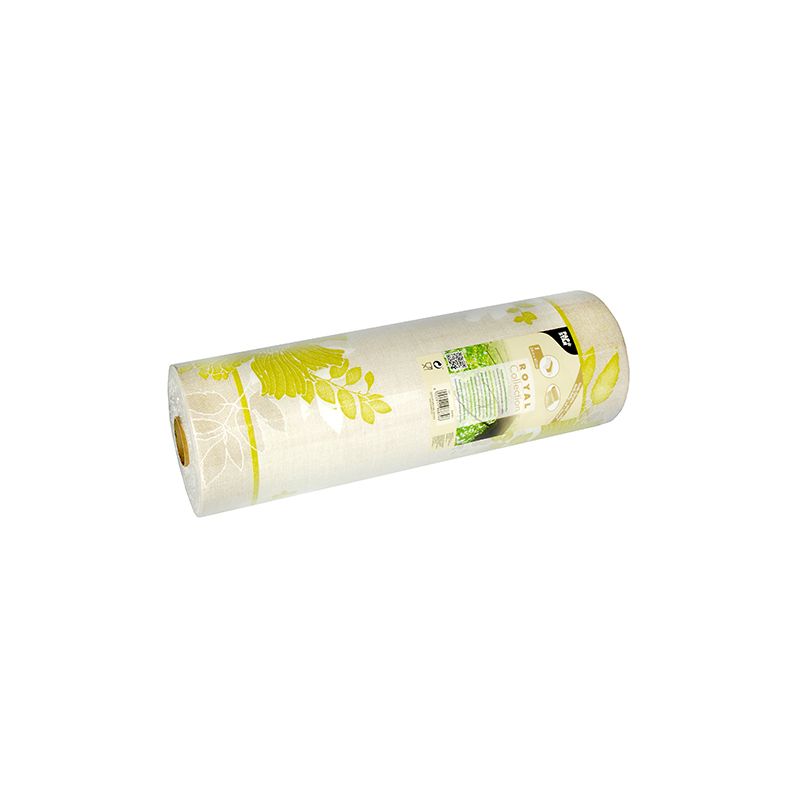 A table runner from the ROYAL Collection of PAPSTAR GmbH shows a floral pattern in yellow and green on a white background. The label is made of a PV-Tissue mix and contains text and product details. The roll leans slightly to the left.
