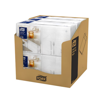 A carton with six packs of Tork 13662 Tork Soft Guten Appetit Cutlery Bag Napkins, each with a blue label. The packaging is adorned with an illustration of a knife, fork, and glass along with the phrase "Guten Appetit" and embodies elegance in dining with every Tork Soft product from Essity Professional Hygiene Germany GmbH.