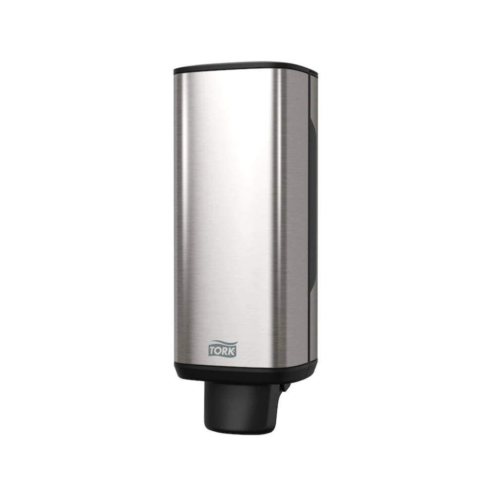 The Tork 460010 dispenser for soap and hand sanitizers from TORK – Essity Professional Hygiene Germany GmbH features a sleek, rectangular stainless steel design with a refined black nozzle at the bottom and the "Tork" logo near the base. Its modern aesthetic stands out beautifully against a white background, making it perfect for dispensing soap and hand sanitizers.