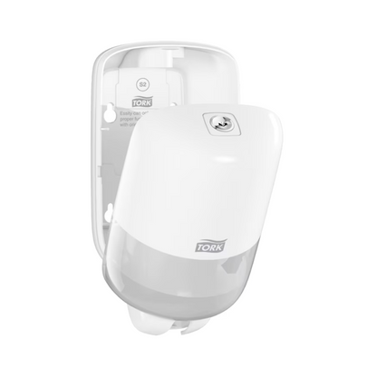 The Tork 561000 Mini Dispenser for Liquid Soap Elevation S2 from TORK - Essity Professional Hygiene Germany GmbH is an elegant white wall-mounted dispenser with an open front cover in the stylish Elevation design. It features a lock and a logo on the front, making it perfect for efficiently storing and dispensing liquid soap hygiene products.