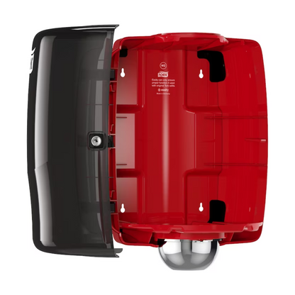A Tork 653008 Maxi Centerfeed Dispenser Performance W2 is depicted against a white background and features a black upper half with a performance-oriented lock and a red lower half that shows the internal structure.