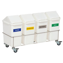 Der Novocal Zimmer-Wertstoffsammler Vierfachsammler verfügt über vier Behälter mit Deckeln und farbigen Etiketten für Papier, Kunststoff, Restmüll und Glas auf einem Gestell mit Rädern aus Edelstahl - ideal für eine effiziente Mülltrennung in jedem Raum.