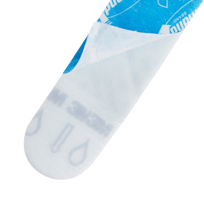 Close-up of a Command™ Strip 17021B, Size M (3M Deutschland GmbH), partially peeled from its blue-white backing paper, revealing the symbols and text printed underneath.