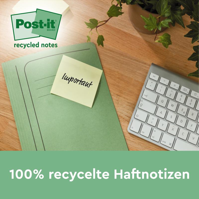 A green folder with a Post-it® Recycling Z-Note from 3M Deutschland GmbH labeled "Important" lies on a wooden desk next to a white keyboard and a green plant. Text below: "100% PEFC eco-friendly notes, 76x76mm, 100 sheets/block, 6 blocks/pack.