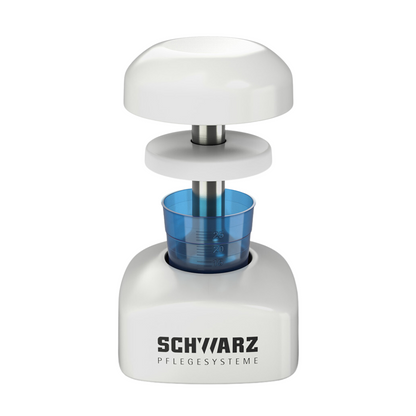 A white kitchen appliance in cylindrical design by Helmut Schwarz GmbH is perfect for hygienic crushing. It features a removable lid and a transparent blue container with measuring markings, ideal for use as a melipul tablet crusher PROFI.